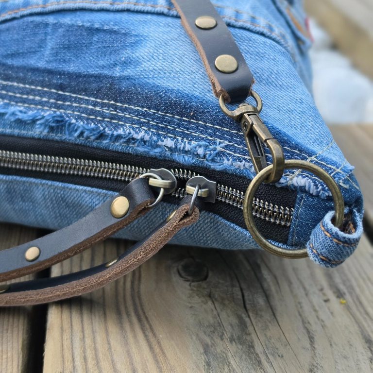 Double zip detail on a Gabus81 reclaimed denim bag