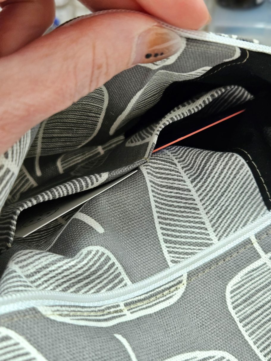 Small Practical Detail Hidden card slots inside the zipped pocket of a handmade denim bag by Gabus81