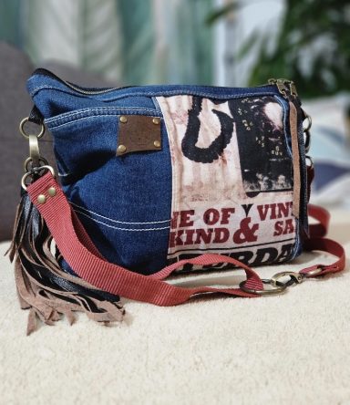 small denim crossbody bag with red strap