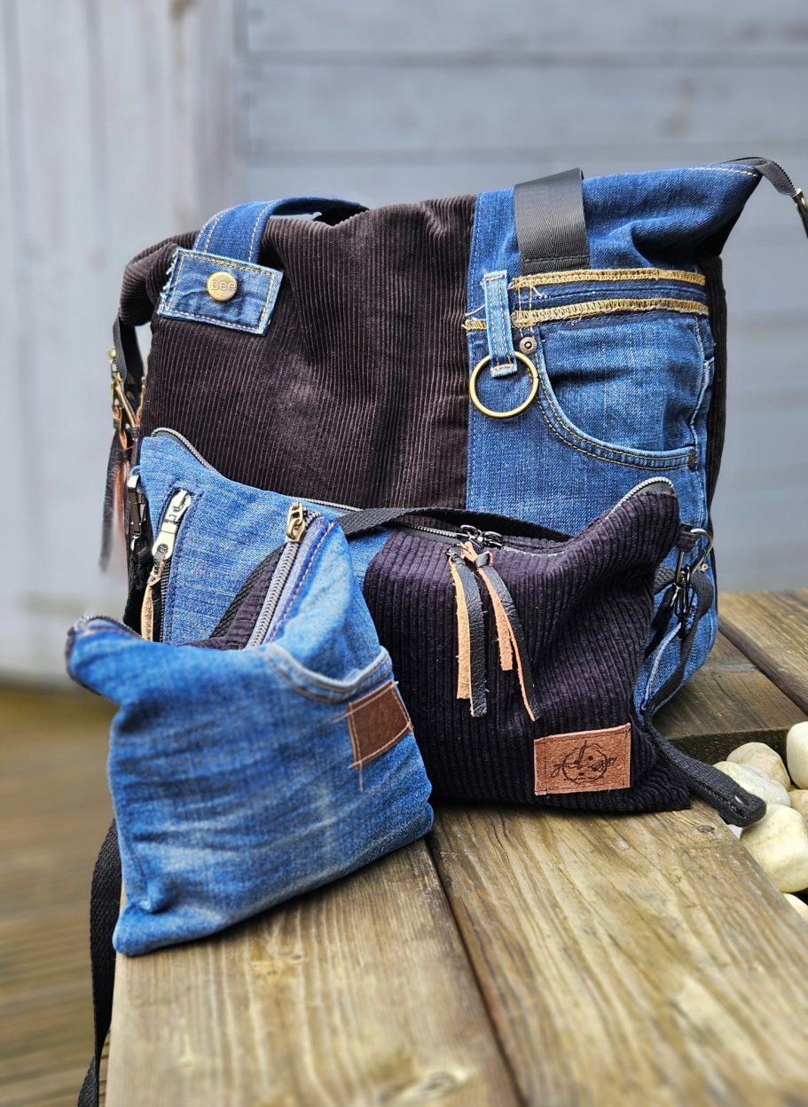 Three bags made from denim and corduroy in shades of blue and brown.