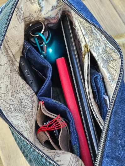 Practical inside pockets in a handmade denim bag for everyday organisation