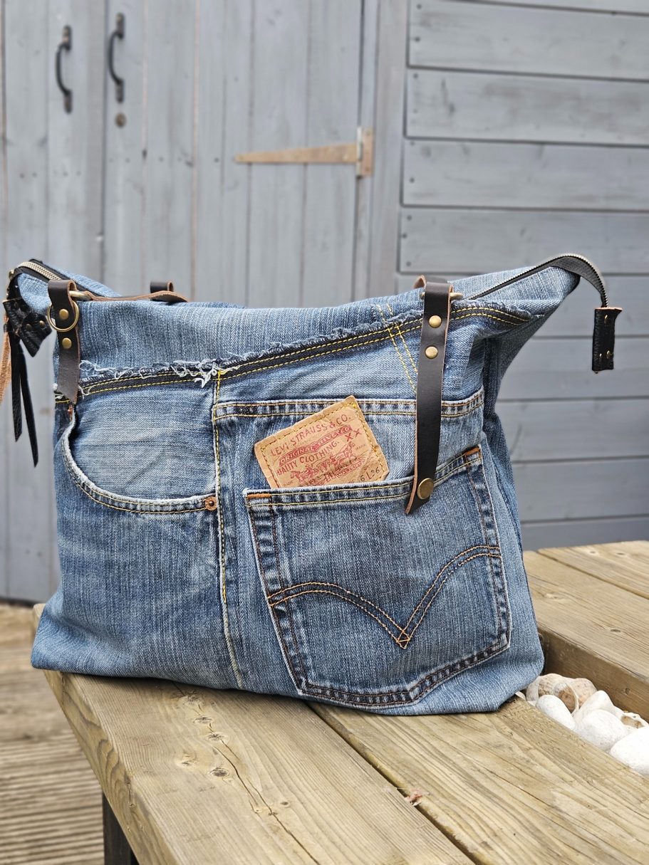 Reclaimed Denim Tote Bag Light blue reclaimed denim tote bag, with original jeans pocket details, leather Gabus81 label and handmade finish.
