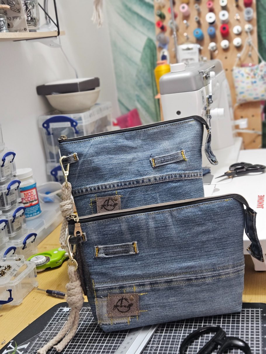 London Denim Collection Group of handmade Gabus81 reclaimed denim bags and cosmetic bags in the sewing workspace, ready for Solo Craft Fair at Elephant Stores in Lo