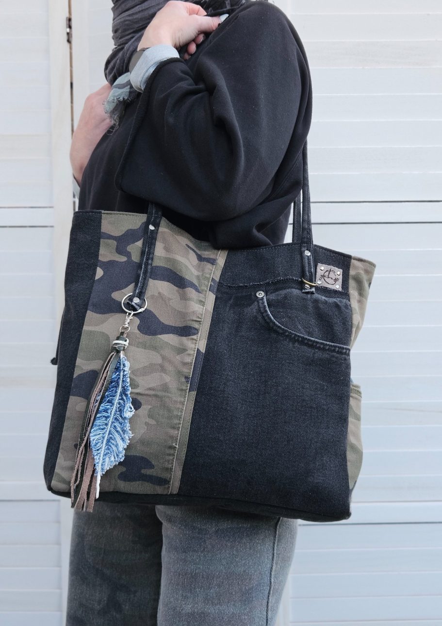 Patchwork Denim Tote Bag Black patchwork denim tote bag worn on the shoulder